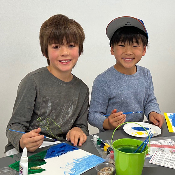 Two Kids painting at the Art Box Academy